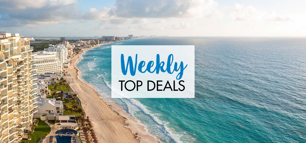 Travel X Aerial view of beachfront city with resort buildings along the shore and "Weekly Top Deals" text overlaid in the center, perfect for your next Travel X vacation. Book Your Trip With Travel X